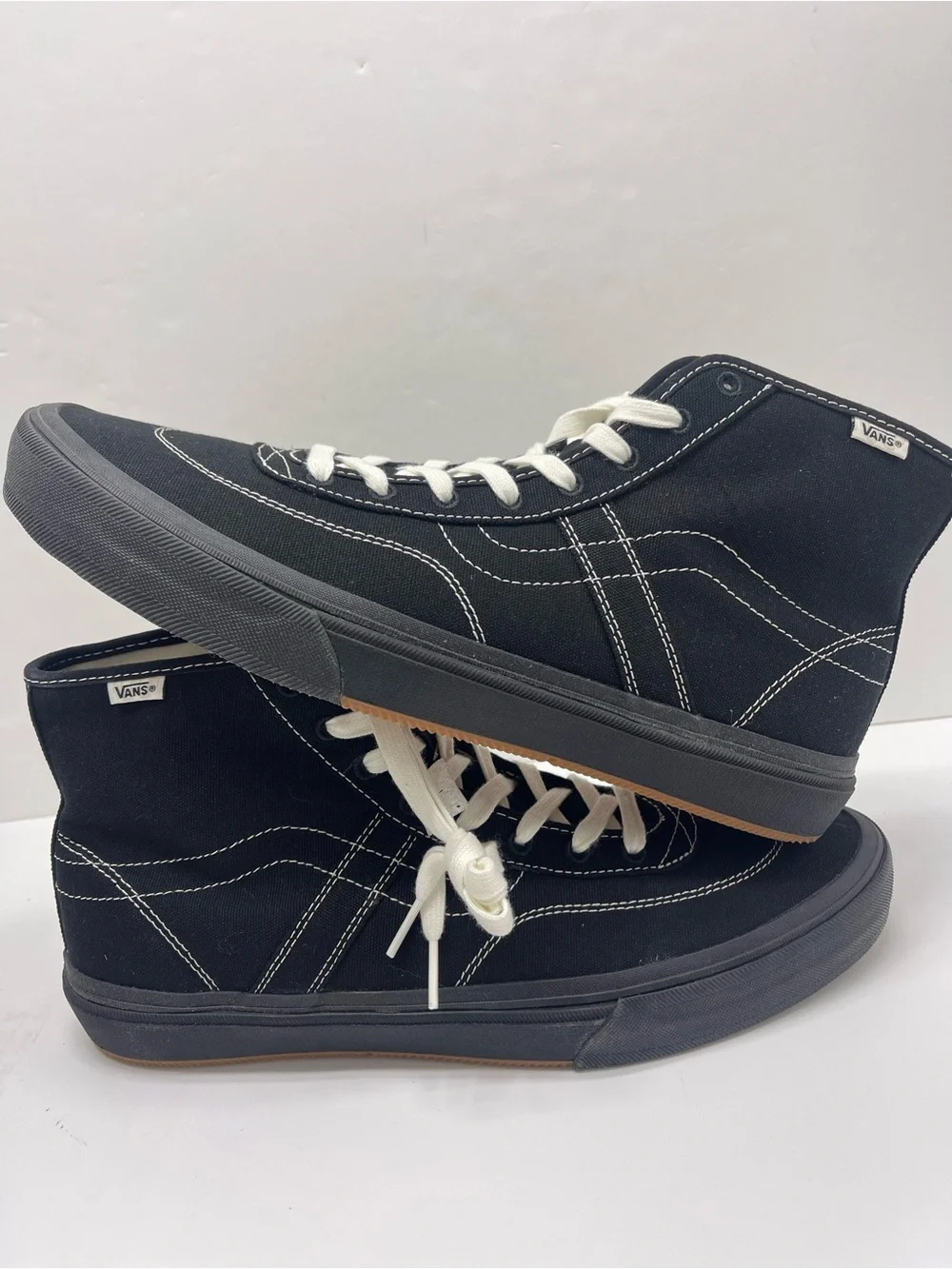 Vans Men’s High-Top Canvas Sneakers in Black and White